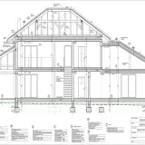 Plany na budowę domu: przekrój architektoniczny z detalami konstrukcyjnymi i materiałowymi.